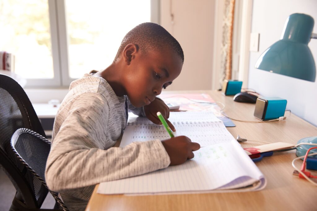 3rd grade boy working on homework