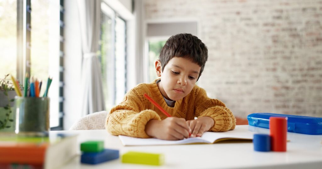 3rd grade boy working on math