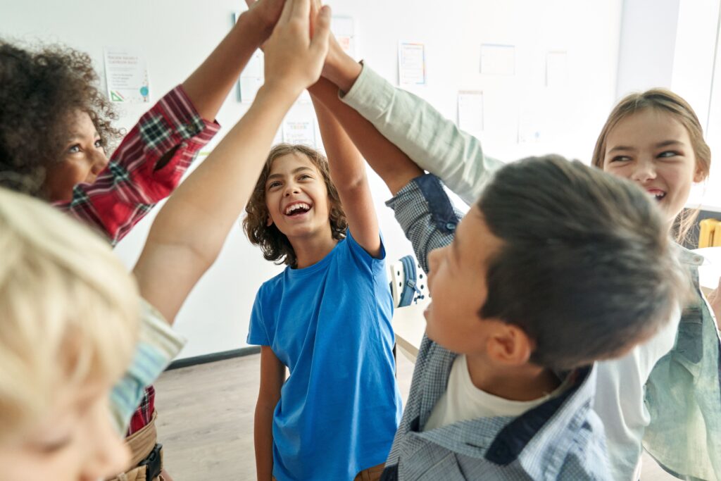 kids high fiving