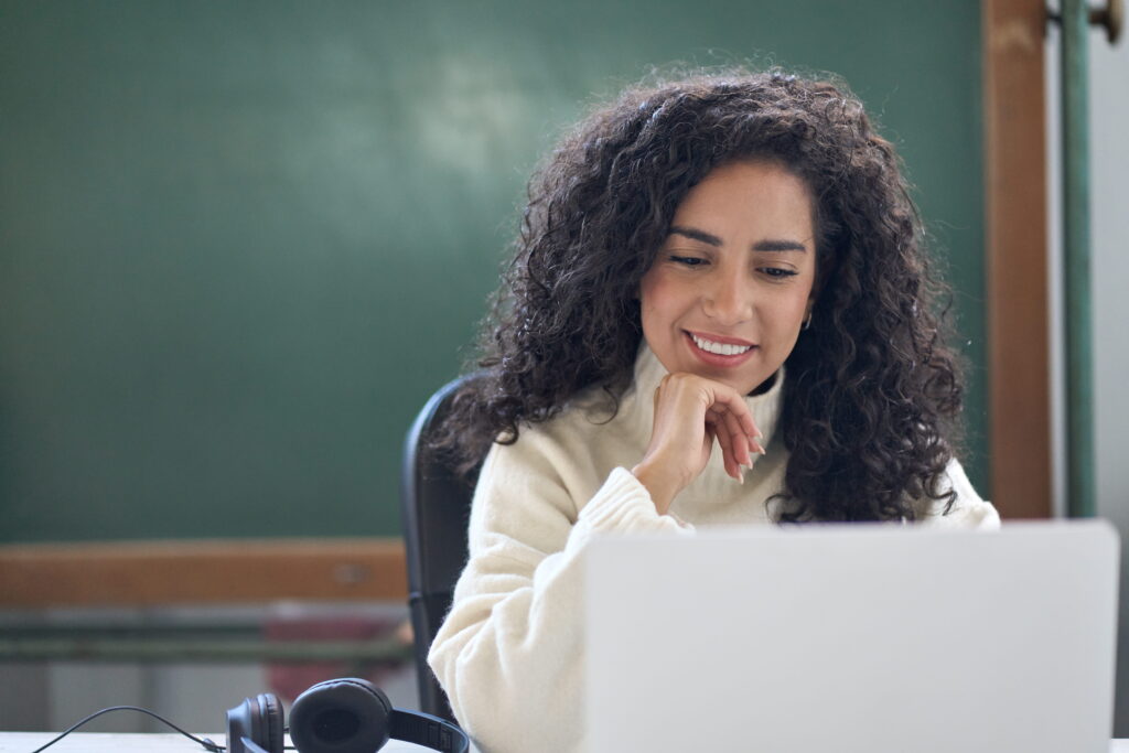 teacher on computer